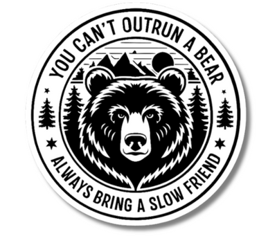 Black and white, circular sticker with bear design and text 'You can't outrun a bear, always bring a slow friend' on a white background.